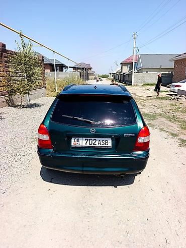 demio sport: Mazda 323: 2000 г., 1.6 л, Механика, Бензин, Лифтбек — 5