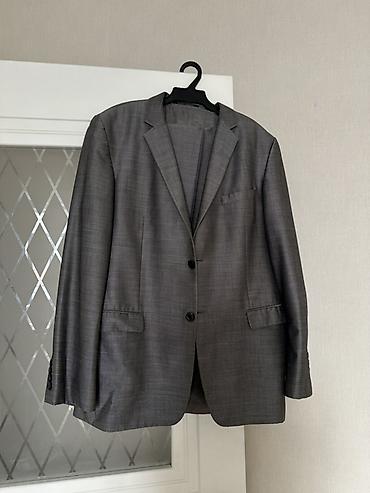 Костюмы: Классические мужские пиджаки темных оттенков. Цены начинаются от — 5