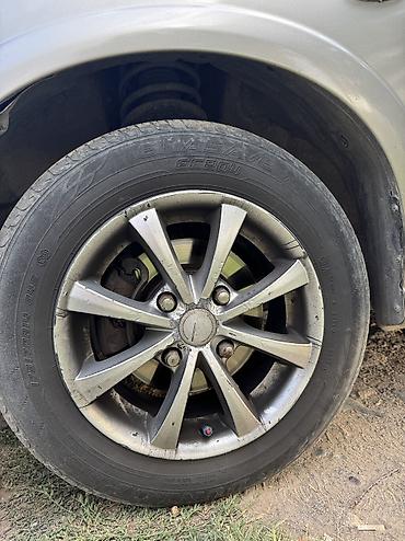 diska 13: Литые диски R14 (кажется 4/100) с шинами Dunlop - Комплект колес на — 2