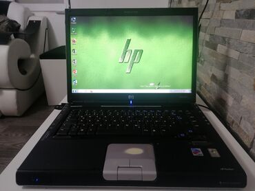crni kaputic postavljen bas: Hp Pavilion DV4000 laptop sa 100gb harda i 2gb rama za office radnje