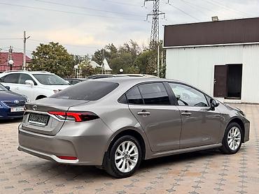corolla 2022: Toyota Corolla: 2021 г., 1.8 л, Вариатор, Гибрид, Седан — 2