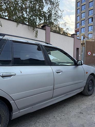 продаю с: Nissan Primera: 2001 г., 2 л, Механика, Бензин, Универсал — 6