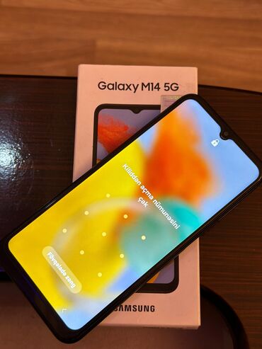 galaxy a4: Samsung Galaxy M14 5G, 64 GB, Barmaq izi, İki sim kartlı