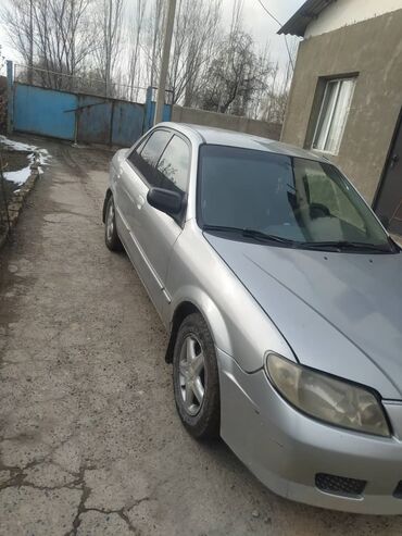 электронной машина: Mazda Protege: 1999 г., 1.6 л, Автомат, Бензин, Седан