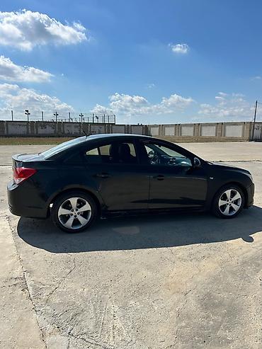 kia rio 2007: Chevrolet Cruze: 1.6 l | 2010 il 197965 km Sedan — 6