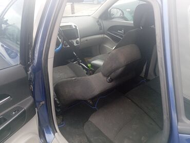 Kia: Kia cee’d SW (universal), tünd mavi rəng. - Kuzov: 5 qapılı — 7