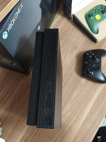xbox seris x: Xbox One X 1TB oyun konsolu Xüsusiyyətlər: - 1TB daxili yaddaş – — 4