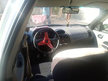 şevrolet aveo satışı: Ağ rəngli sedan avtomobil - Kuzov: 4 qapılı sedan, ağ rəng - Yüngül — 4