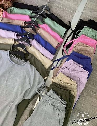 papuce cupave: Ženski dvodelni trenerka komplet – majica + pantalone sa džepovima — 9