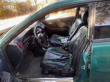 Продажа авто: Mazda Lantis: 1995 г., Бензин, Хэтчбэк — 10