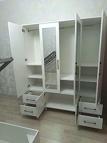 borular: Ağ rəngdə, güzgülü 4 qapılı paltar dolabı. Xüsusiyyətlər: - Ön — 2