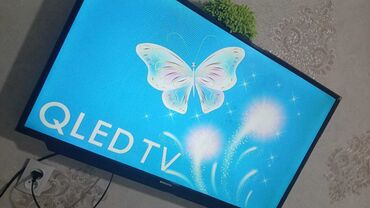 Телевизоры: Телевизор Samsung QLED TV с ярким и четким изображением. Идеально
