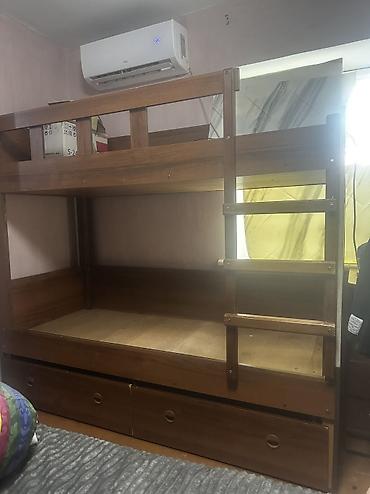 Продается кровать двухъярусная,выдерживает до 100 кг