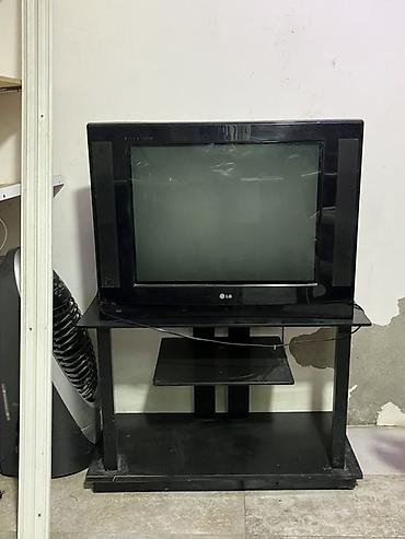 televizor satişi: LG televiziya + TV Televizor və televizor altlıqı 2 sidə satılır. Ayrı — 1
