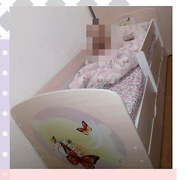 Детская кровать без съёмного бортика и ящиками для хранения. -