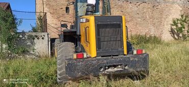 Погрузчики: Погрузчик, 2012 г., Колесный, Фронтальный — 2