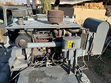 Зерноуборочные комбайны: Зерноуборочный комбайн Ростсельмаш. - Полноразмерная жатка с — 12