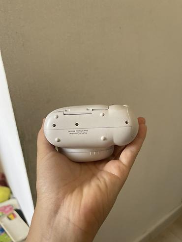digital camera: Fujifilm Instax Mini 12 — мгновенная камера белого цвета. Основные — 6