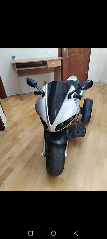 Uşaq üçün elektrikli üçtəkərli motosiklet.yenidir.5 defe surulub.ev