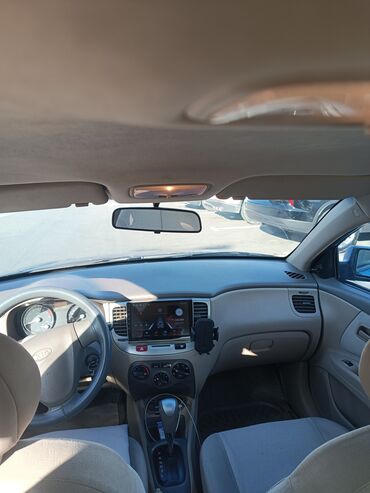 Kia: Kia Rio sedan – mavi rəng, 4 qapı. Texniki və dizayn xüsusiyyətləri — 7