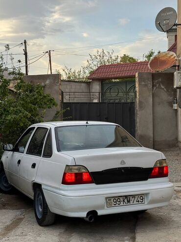 Daewoo: Daewoo Nexia, ağ rəngli sedan. Xarici:heç bir prablemi yoxdur real — 14