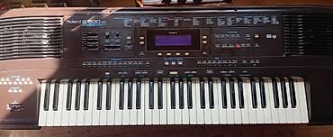 zeng ucun gitara: Roland E-500 OR aranjer sintezator - 61 klaviş (dinamik hissiyatlı) - — 7