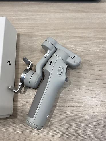 стробоскопы на авто: Стабилизатор для смартфона DJI Osmo Mobile 7 - Компактный складной — 1