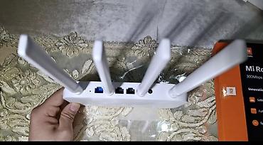 iphoni 11: Xiaomi Mi Router 4C – 300 Mbps Wi‑Fi router Xüsusiyyətlər: - 2.4 GHz — 5