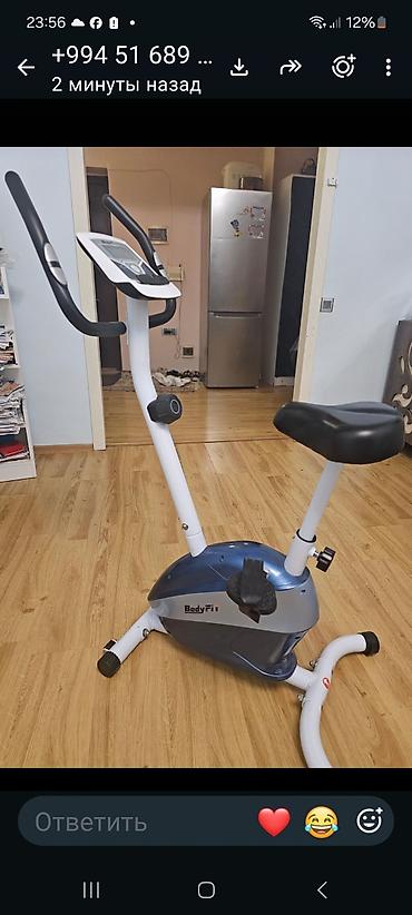 ağ canta: BodyFit stasionar velotrenajor - Kompakt, ev üçün uyğun kardio aparat — 3