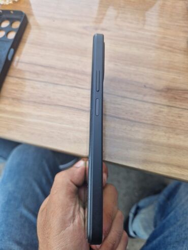 Fly: Məhsul: Smartfon (qara rəng) Xüsusiyyətlər: - Korpus: mat qara, düz