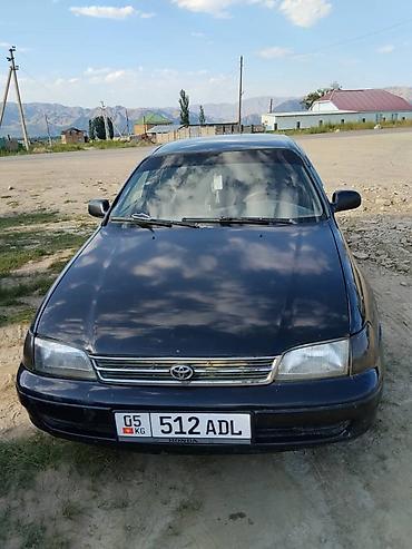 короми: Toyota Carina E: 1999 г., Бензин, Седан — 3