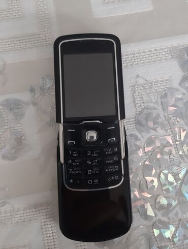 8600 luna: Nokia 1, rəng - Qara, Düyməli