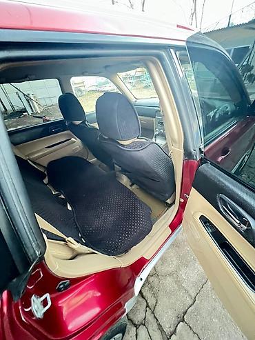 Subaru: Subaru Forester: 2004 г., Бензин — 8