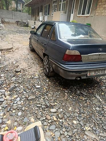 салон машины: Daewoo Nexia: 2003 г., Бензин, Седан — 3