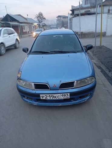 зарядник аккумулятора автомобиля: Mitsubishi Carisma: 2001 г., 1.8 л, Автомат, Бензин, Седан