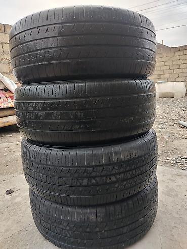 Təkərlər: 4 ədəd avtomobil şini - Ölçü: 235/60 R18 - Yük/sürət indeksi: 100H - — 1