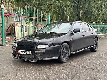 жентра цена: Mazda Lantis: 1999 г., Механика, Бензин, Седан — 1