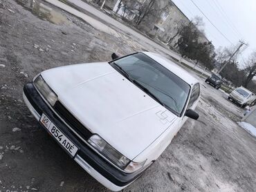 ключ мазда: Представляем седан Mazda 626 белого цвета, оснащенный бензиновым