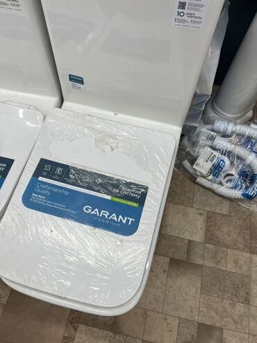 Раковины для ванной: Белый унитаз Garat Premium с гарантией на систему. Этот унитаз имеет