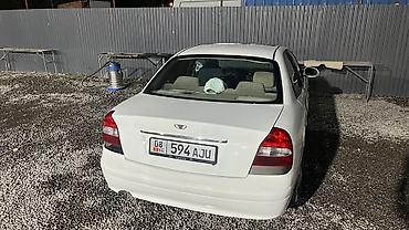 предлогайте варианты: Daewoo Nubira: 2000 г., 1.5 л, Механика, Бензин, Седан — 2