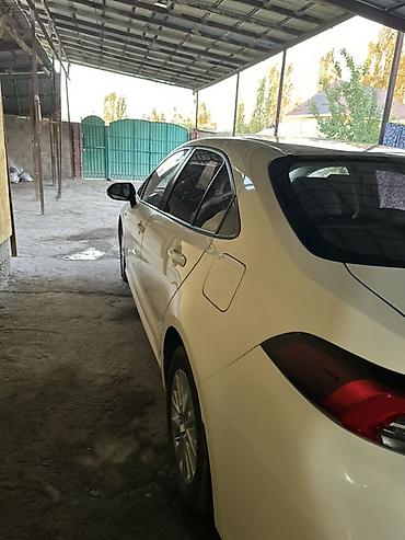 byd e1: Toyota Corolla: 2019 г., 1.8 л, Гибрид, Седан — 5