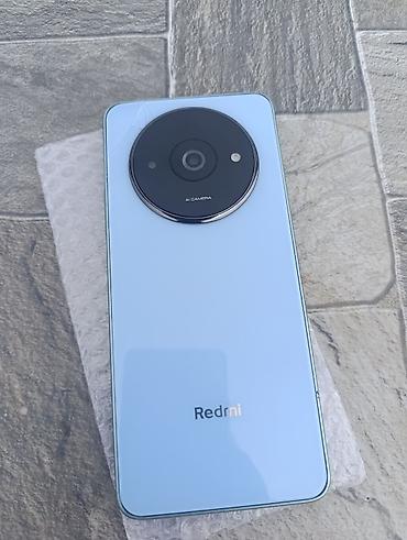 Мобильные телефоны: Redmi A3x, 64 ГБ, цвет - Голубой — 1