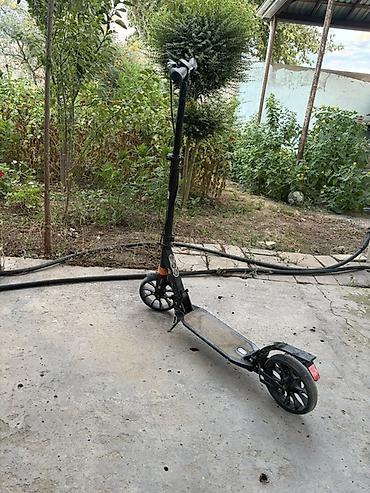 2 tekerli scooter: Şəhər içi rahat hərəkət üçün yüngül və kompakt skuter. Xüsusiyyətlər — 1