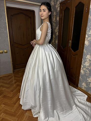 Свадебные платья: Свадебные платья б/у в отличном состоянии — 17