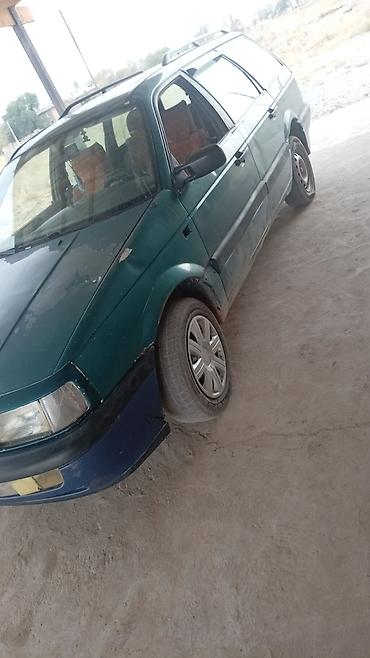 боковое: Volkswagen Passat Variant: 1990 г., Универсал — 3