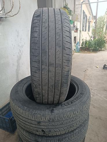 diski teker type 1: 225/60 R18 ölçüdə avtomobil şinləri. Şinlərin üzərində M+S işarəsi — 6