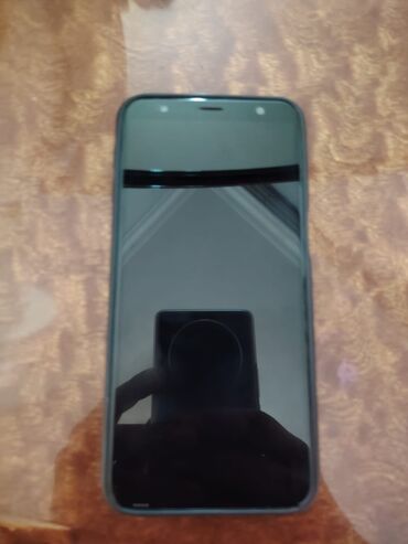 samsung j6 qiymeti islenmis: Samsung Galaxy J6 Plus, 32 GB, rəng - Qara, Sənədlərlə, İki sim kartlı, Face ID