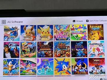 Nintendo Switch: Nintendo Switch OLED konzola cipovana 64gb + 512gb microSD sa 140 — 7