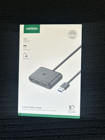 Monitorlar: UGREEN brendinin 4 portlu USB 3.0 habı. Bu cihaz kompüterinizə əlavə