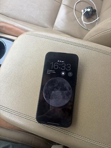 Смартфон Apple iPhone (серия с двумя крупными камерами) в черном